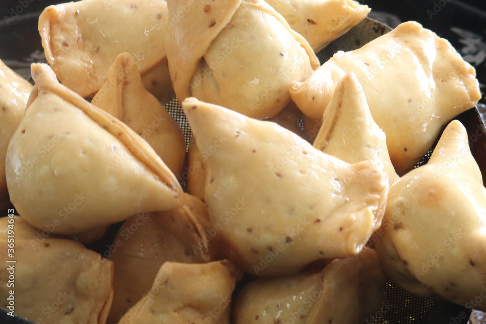 Samosa is a fried pastry with a savoury filling of ingredients like ...