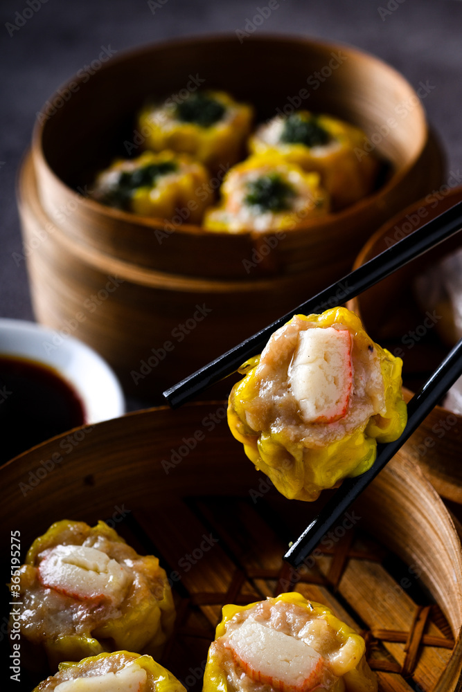 Dim SUM . Chinese dimsum bamboo steamer Dim SUM . Chinese dimsum bamboo steamer