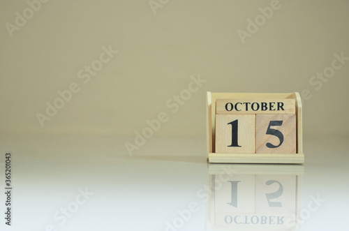 October 15, Number cube with the reflection on the ground.