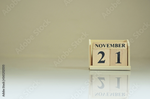 November 21, Number cube with the reflection on the ground.