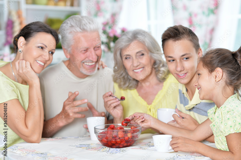 Close-up portrait of big happy family eating Close-up portrait of big happy family eating
