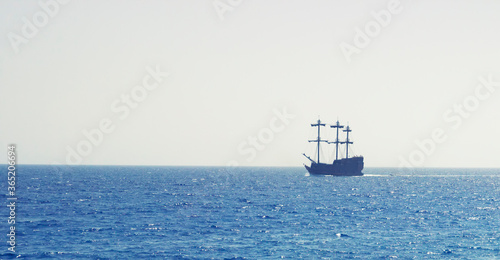 Lonely sailboat on the horizon