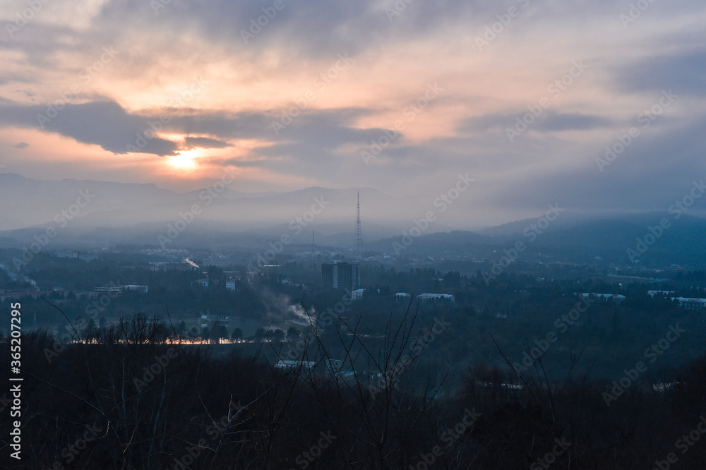 Fototapeta premium time lapse clouds over the city