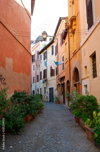 Fototapeta Naklejka Na Ścianę i Meble -  Street with hanging laundry in Rome, Italy