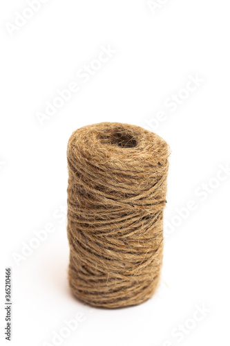 A skein of brown twine on a white background. Isolate.