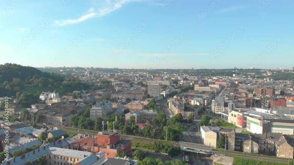Provincial town cityscape buildings and temples aerial drone forward push in camera movement Provincial town cityscape buildings and temples aerial drone forward push in camera movement