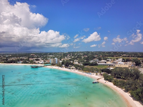 Fototapeta Naklejka Na Ścianę i Meble -  Caribbean Beach and Sea: Birds Eye Drone View of the Turquoise Ocean and White Sand at the Tropical Pebbles Beach in Carlisle Bay, Barbados