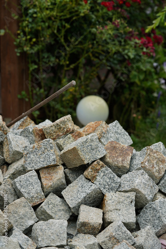 pile of granite cubes in the yard photo