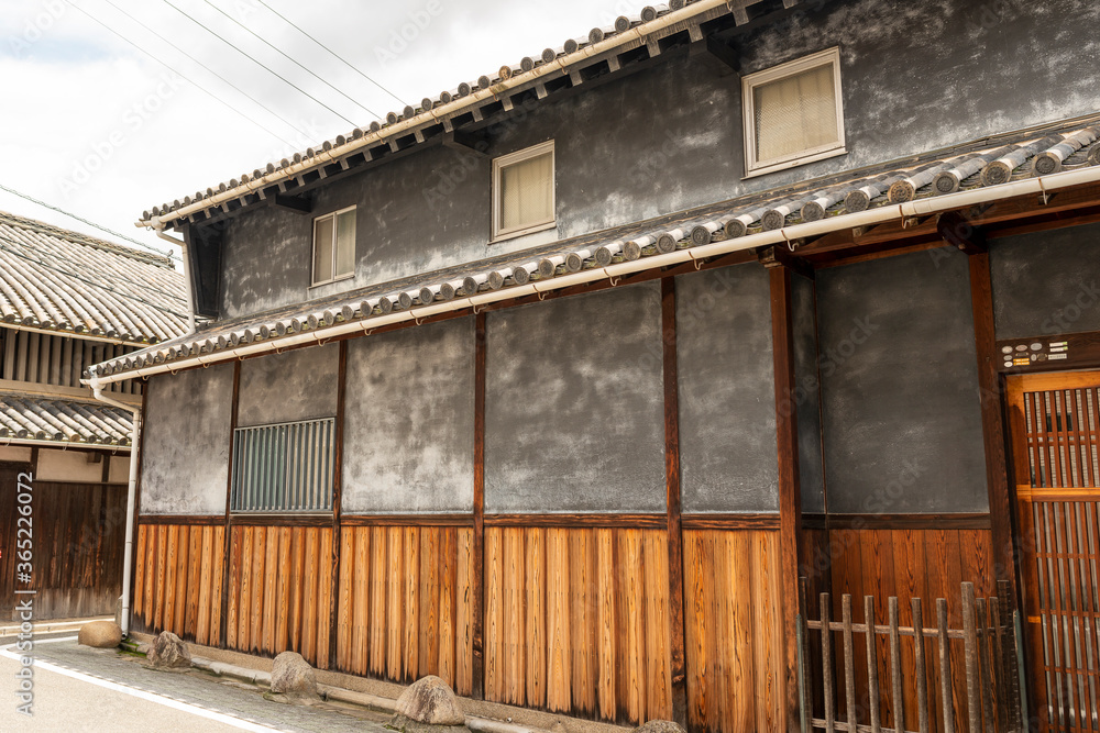 Street view of an old and traditional sake brewery house in Ikeda city, Osaka, Japan