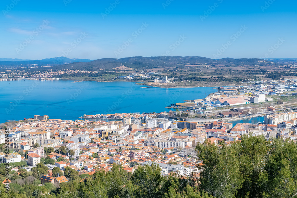 Sète in France, aerial panorama, the harbor and the city with typical tiles roofs
