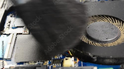 dusty fan inside the laptop during servicing