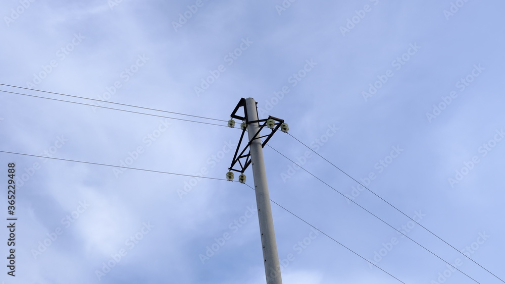Electric pole with wires in the countryside
Electric pole with wires in the countryside