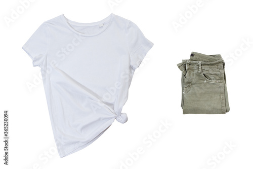 White t-shirt and green folded pants on a white background, t shirt mock up