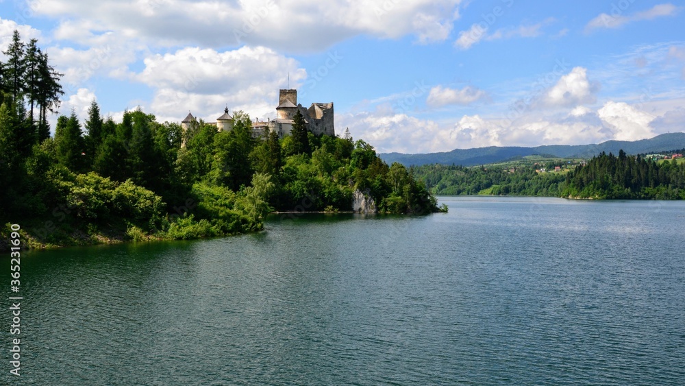 Lake Czorsztyn and medieval castle in Niedzica. The beauty of nature and architecture in Southern Poland. Medieval Castle in Niedzica, built in 14th century and artificial Czorsztyn Lake Lake Czorsztyn and medieval castle in Niedzica. The beauty of nature and architecture in Southern Poland. Medieval Castle in Niedzica, built in 14th century and artificial Czorsztyn Lake