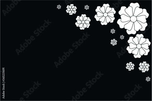 Black background with white flowers in the upper right corner