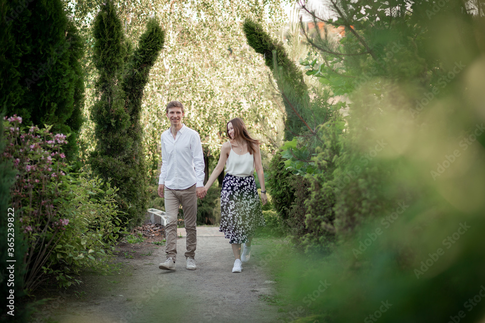 Fototapeta premium The young cute couple on nature