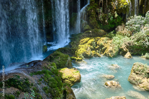 Mountain forest waterfall and flowing river. Yerkopru waterfall, Turkey photo