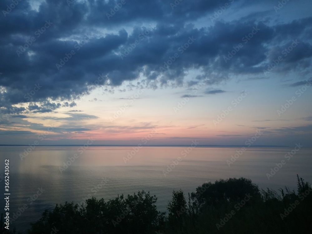 Obraz premium sunset over the river