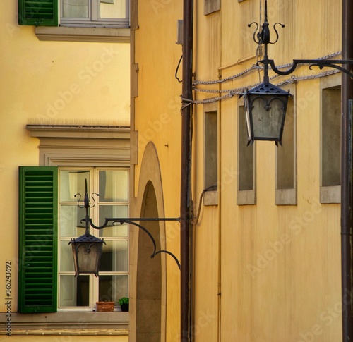 old street lamp in medieval Arezzo town, Italy photo