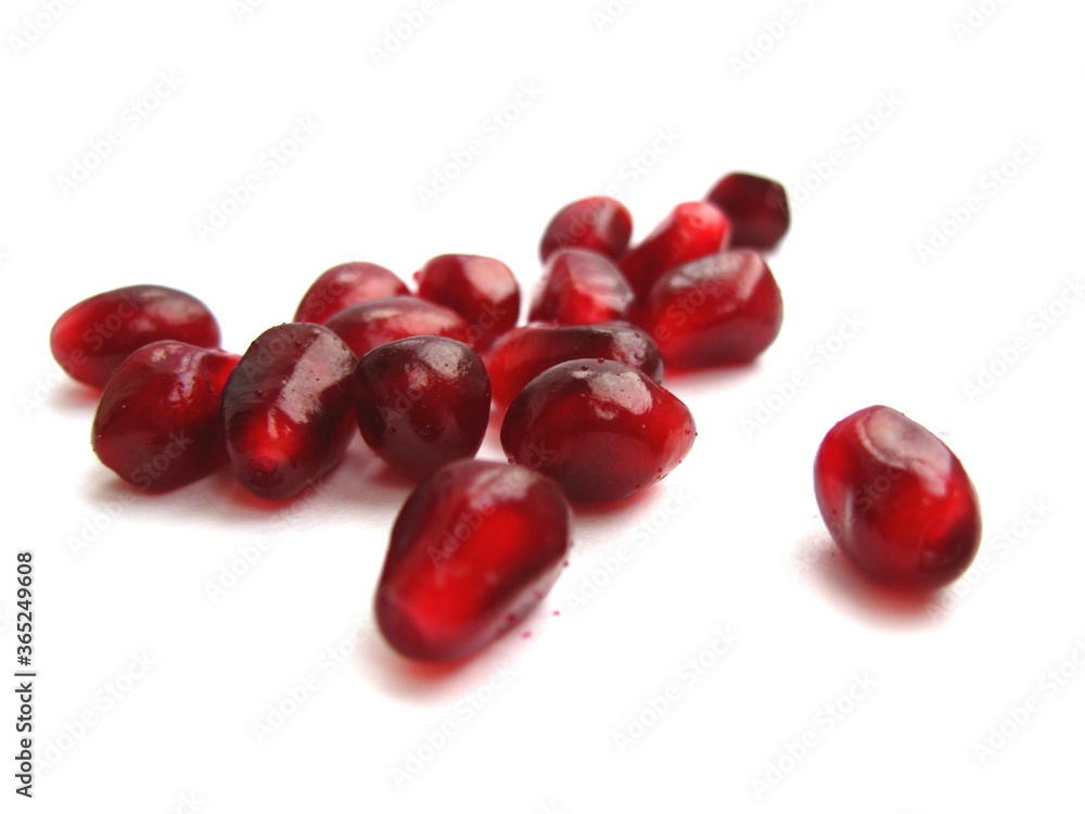 Pomegranate seeds isolated on a white background. Pomegranate seeds isolated on a white background.