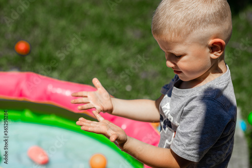 baby washes his hands