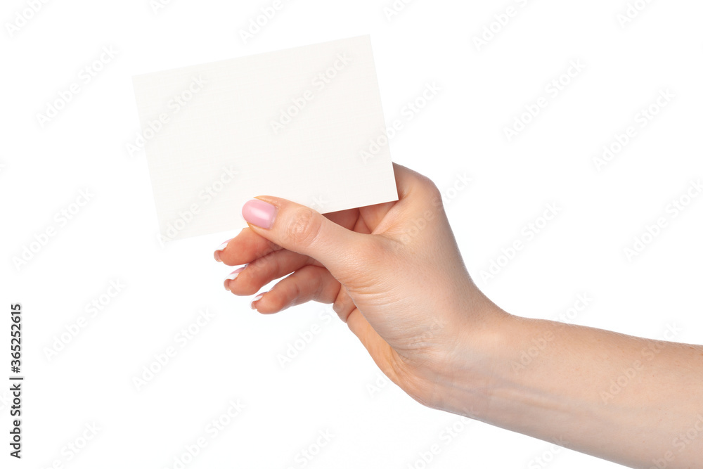Woman's hand with blank white business card isolated on white Woman's hand with blank white business card isolated on white