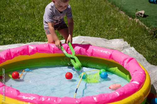 child play at the pool