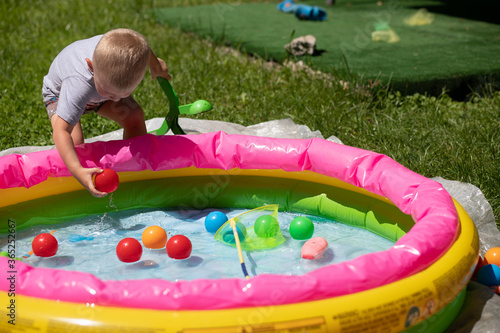 child play at the pool