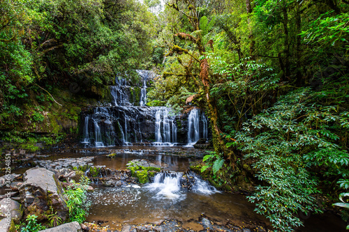 The waterfalls among the green forest