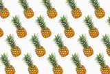 Fruit pattern from real pineapple photographs on white background.