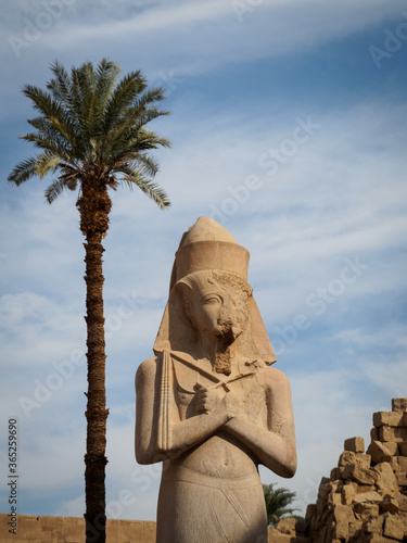 the huge statue of ramses ii is the centrepiece inside karnak temple photo