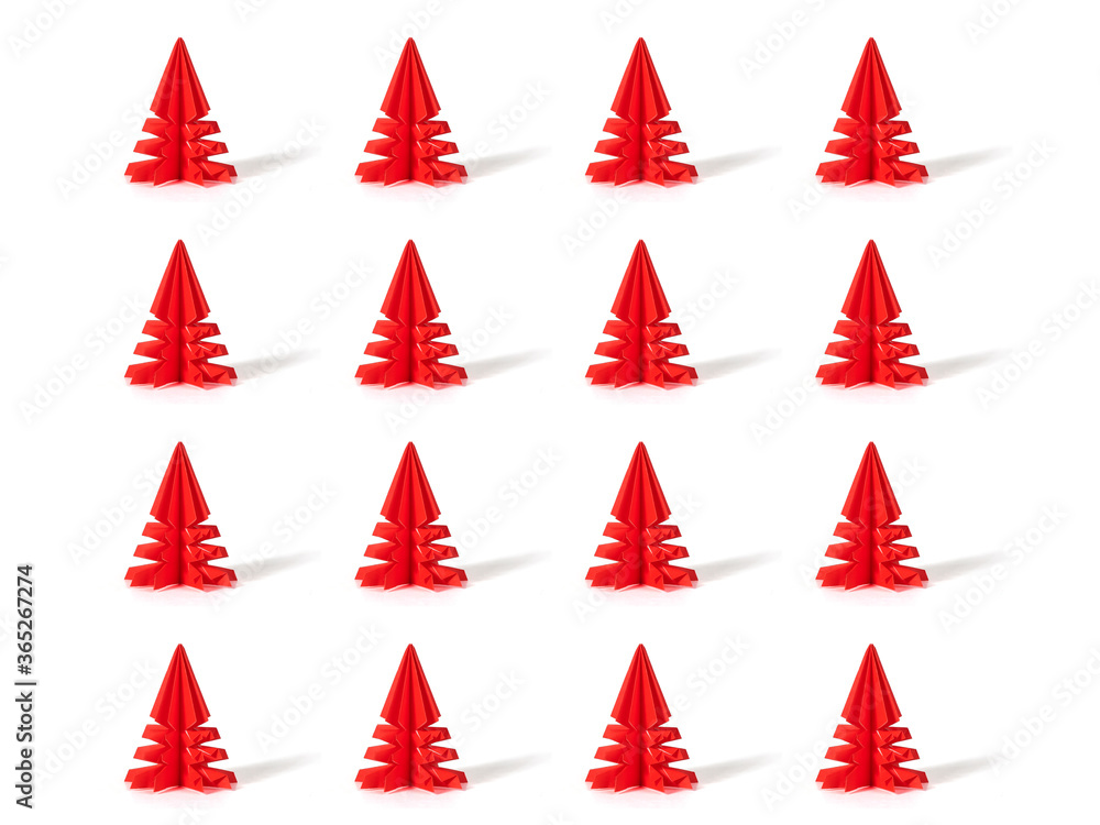 Obraz premium Handmade Christmas decorations. Origami art made of folded paper. Creative background for holiday seasons.