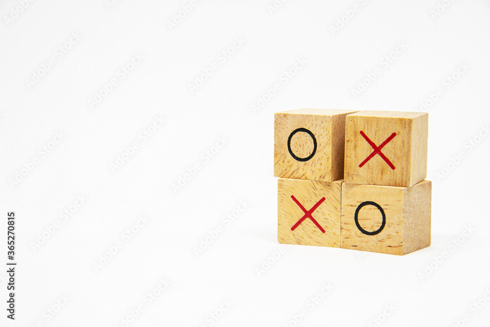 Side view two layer of wooden square block with O and X character ...
