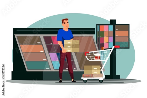 Man choose glue, stoneware tile in hardware store