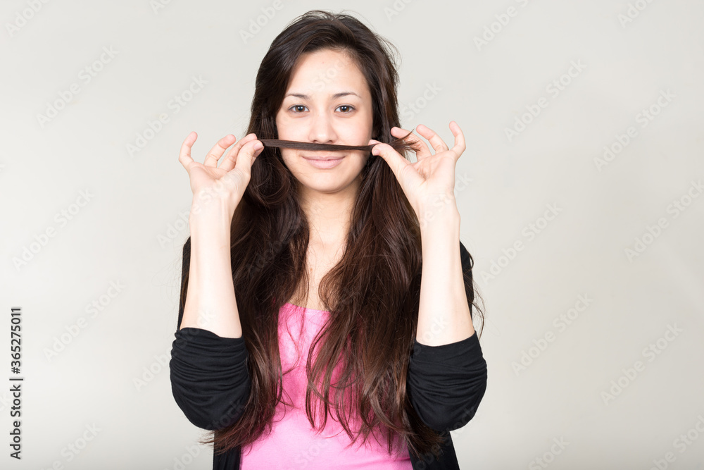 Portrait of young beautiful woman against white background Portrait of young beautiful woman against white background