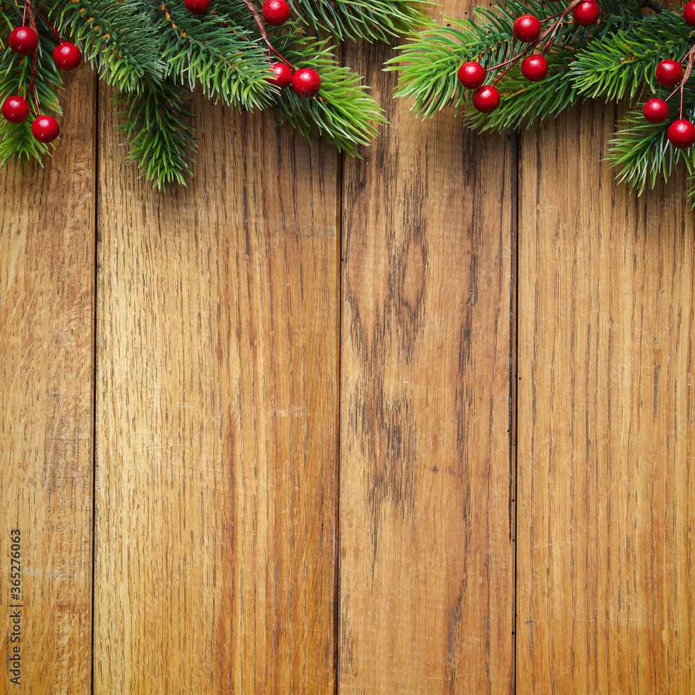 Christmas fir tree on wooden board