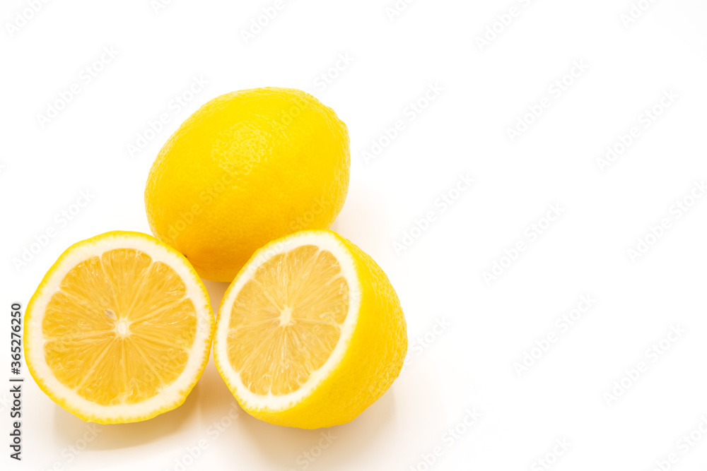 Yellow lemon fruit with a white background,.Isolate and copy space for text and design,Lemon is a citrus fruit with high vitamin C, Lime can be cooking for food and dessert.