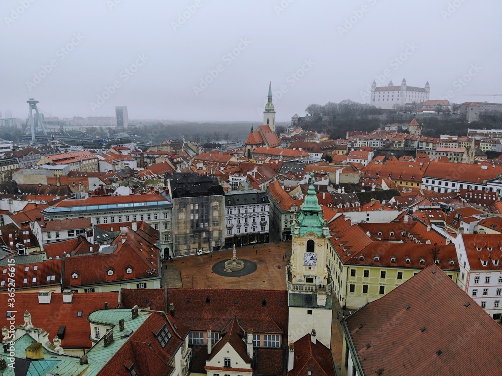 Slovakia, Bratislava. Historical centre. Aerial view from above, created by drone. Foggy day town landscape, travel photography. Old city castle