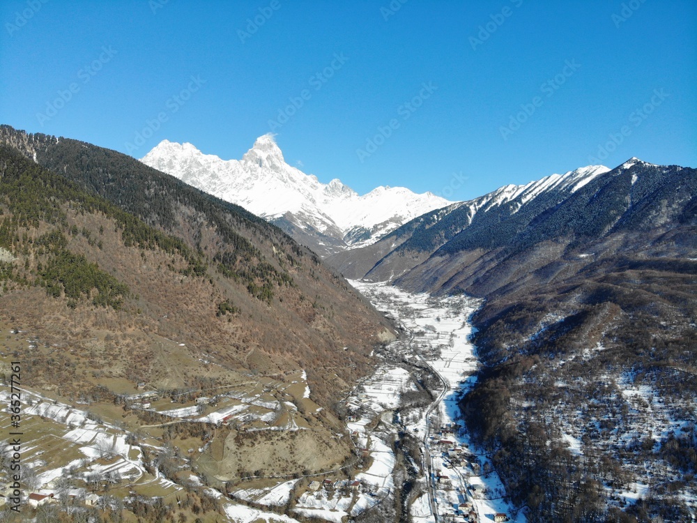 Obraz premium Georgia. Svaneti Region, mountain Ushba. View from above, perfect landscape photo, created by drone. Aerial photo from travel.