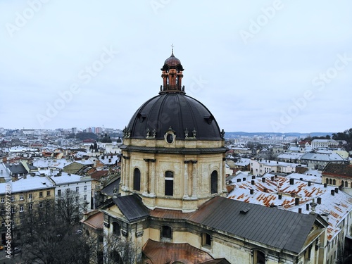 Aerial view from above of Lviv city, Ukraine. Beautiful drone photography. Town Hall tower and cathedral church, city centre