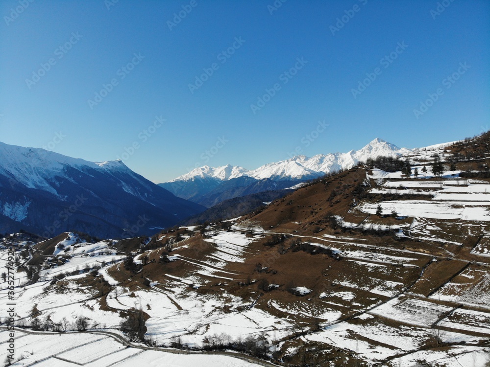 Georgia. Svaneti Region, mountain city Mestia. Land of Towers. View from above, perfect landscape photo, created by drone. Aerial photo from travel.