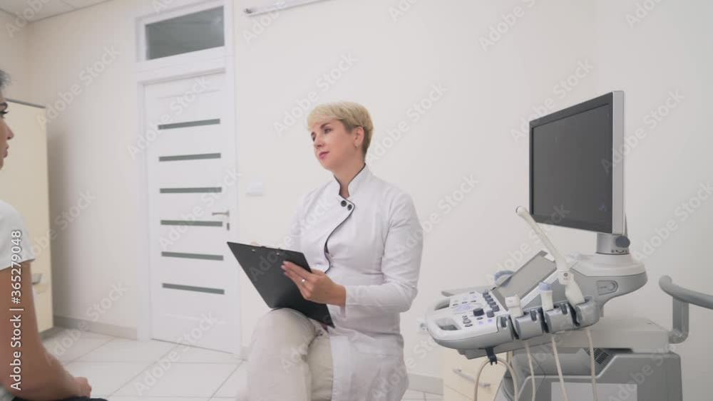 Patient explaining problem to doctor. Patient explaining problem to doctor.