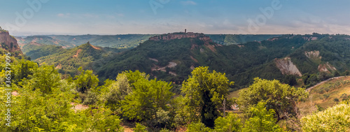 A panorama view from Lubriano towards the settlement Civita di Bagnoregio in Lazio, Italy in summer