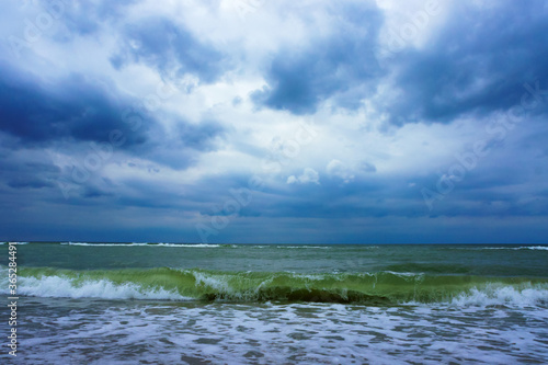 Sea coast. Tides and storms at sea. Waves on the Baltic Sea. Deserted seashore.