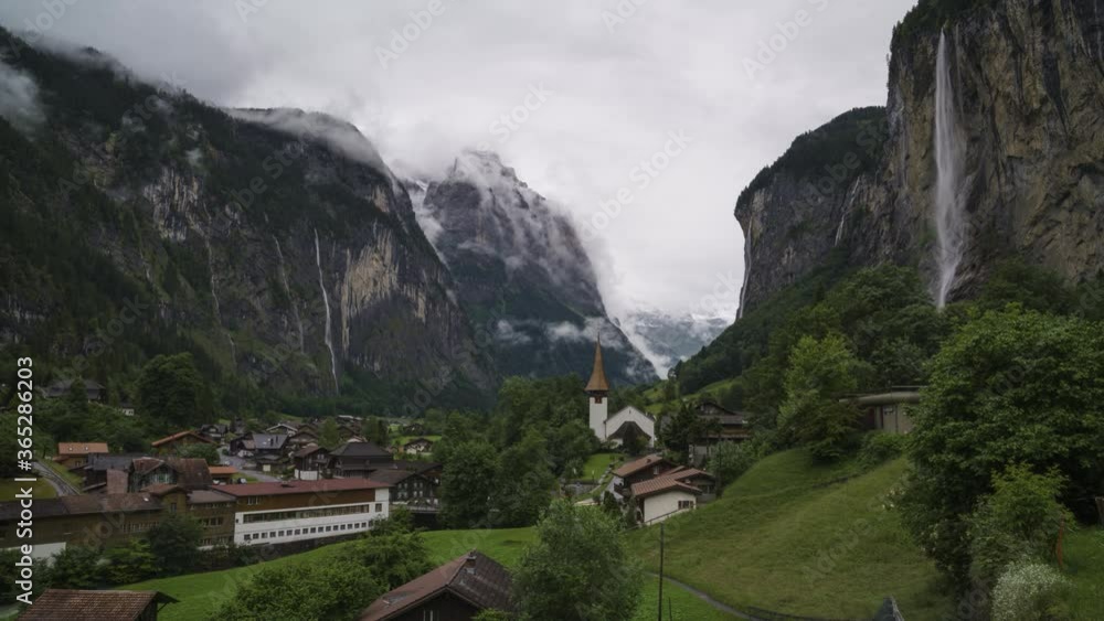 The beautiful Staubbachfall waterfall by the village of Lauterbrunnen in Switzerland - time lapse The beautiful Staubbachfall waterfall by the village of Lauterbrunnen in Switzerland - time lapse