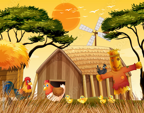 Farm scene in nature with barn and windmill and chicken