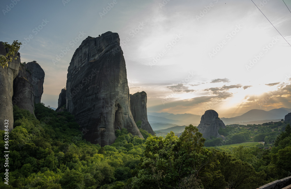 The Meteora monasteries with their scenic location on the rocks in Greece with sunset