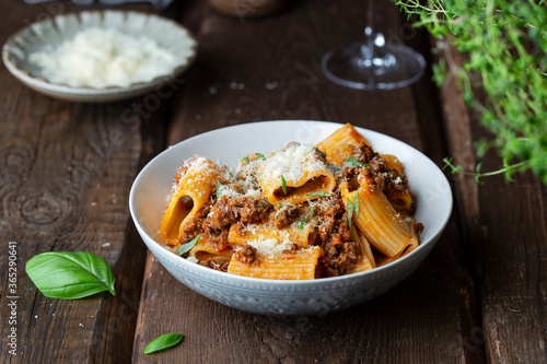 Canvas-taulu rigatoni Pasta with Bolognese Sauce, Parmesan and Basil