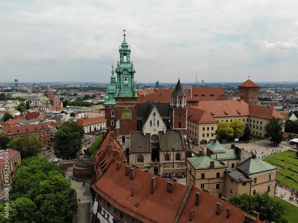 Fototapeta premium Aerial photo from drone. The culture and historical capital of Poland. Comfortable and beautiful Krakow. The land of Legend. The Wawel Castle.
