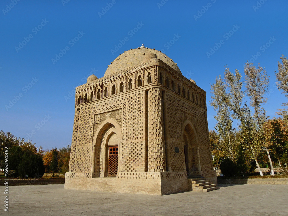 Most ancient construction in Bukhara - Samanid Mausoleum, gem of Central Asian architecture. This building made of baked bricks and decorated with traditional eastern ornaments, Bukhara, Uzbekistan